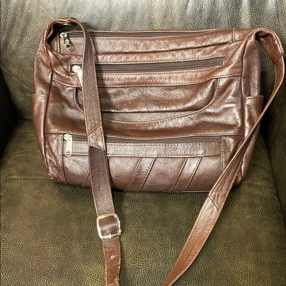 Brown Leather Messenger Bag with Adjustable Strap and Multiple Compartme…